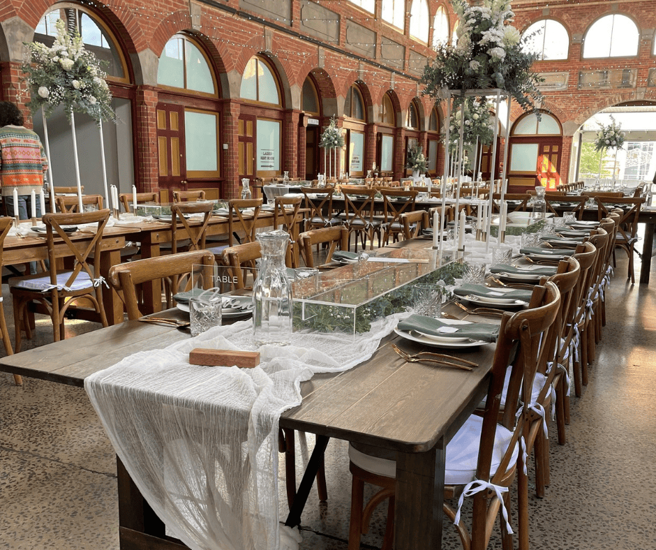 Dark Farm Tables x 11<br>2.43mx1.02m<br>seats 3 each side<br>& 1 at the ends<br>$24 each*